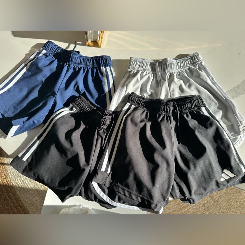 4 pairs boys adidas shorts. Size small